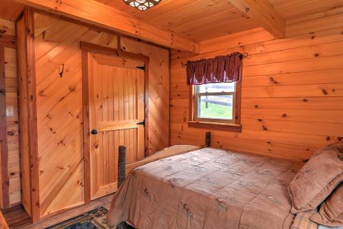 Rustic Dundee Log Cabin with Hot Tub and Forest Views!