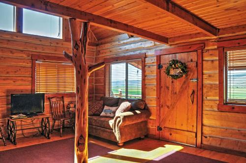 Remote Antimony Log Cabin with Green Meadow Views! - image 9