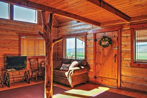 Remote Antimony Log Cabin with Green Meadow Views!