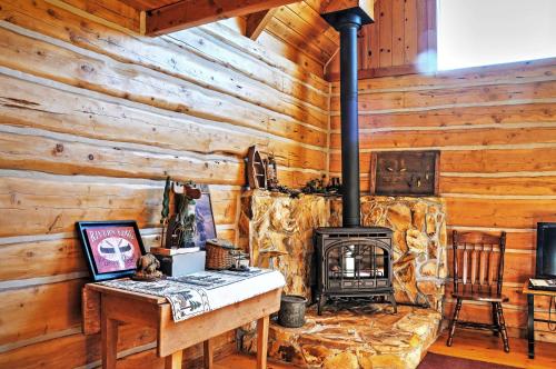 Remote Antimony Log Cabin with Green Meadow Views!