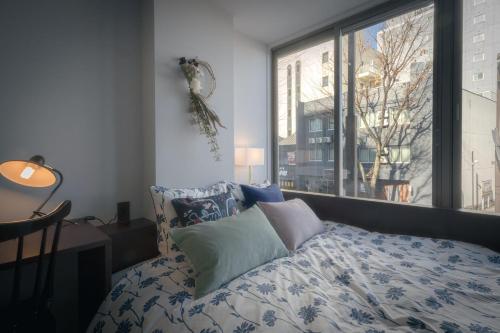 Queen Room with Shared Bathroom