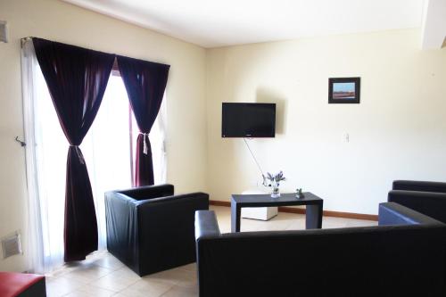 Стая за гости, Diez ApartHotel in Пуерто Мадрин