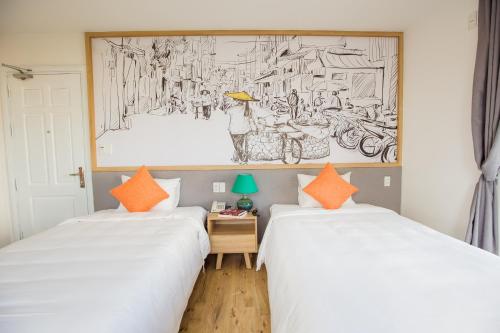 Deluxe Twin Room with Balcony room in Cocochine - a VIE collection