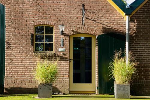 ทางเข้า, Gastenverblijf Eenink in เฮนเจโล