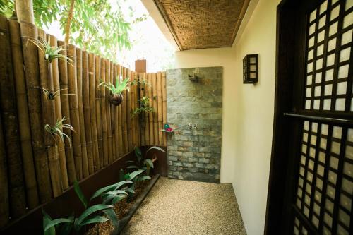 Shower, Fox & Firefly Cottages in Loboc