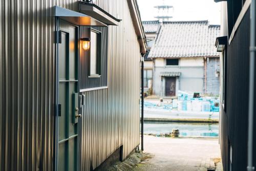 Entrance, MINKA Riverside Villas in Imizu