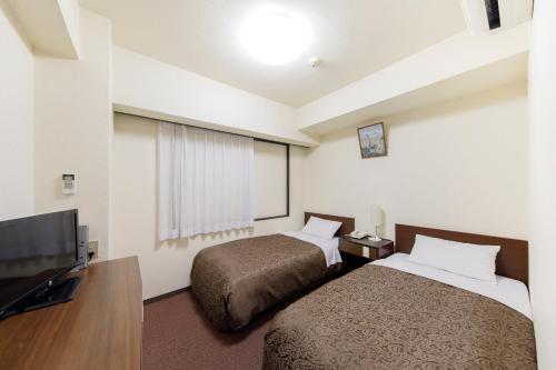 Sunny Stone Hotel II in Suita