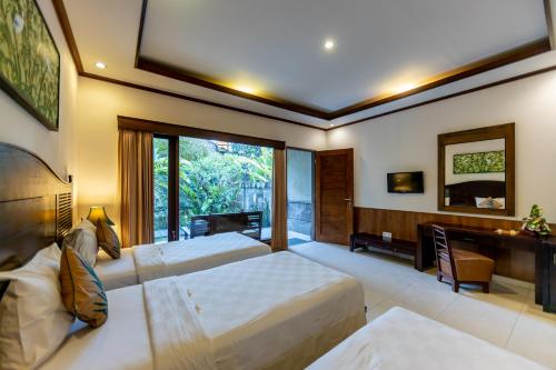 De Munut Balinese Resort & Spa Room Type - Economy Triple Room