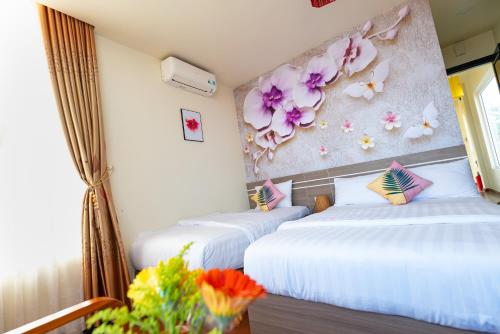 Deluxe Family Room room in Flora Hotel Hue