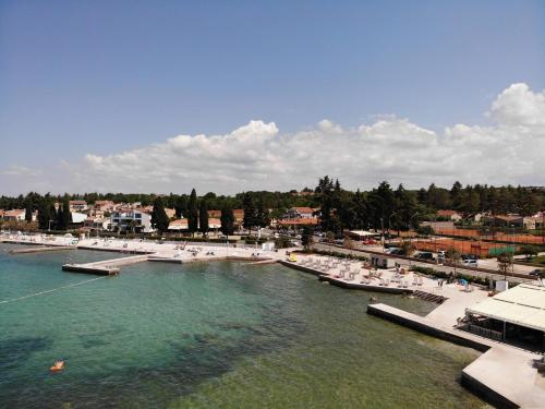 Apartments Sain with garden terrace near the beach Over view