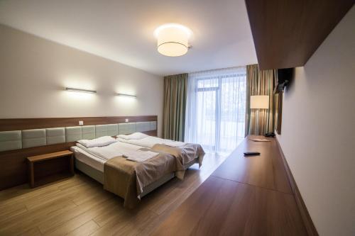 Olymp 3 Olymp 3 is perfectly located for both business and leisure guests in Kolobrzeg. The hotel offers a wide range of amenities and perks to ensure you have a great time. To be found at the hotel are busin