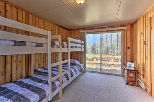 Family Home with Deck Walk to Big Bass Lake! - image 6