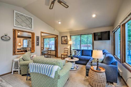Higgins Lake Home with Dock Fire Pit and Deck! - main image