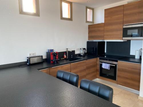 T2 en duplex avec solarium face mer