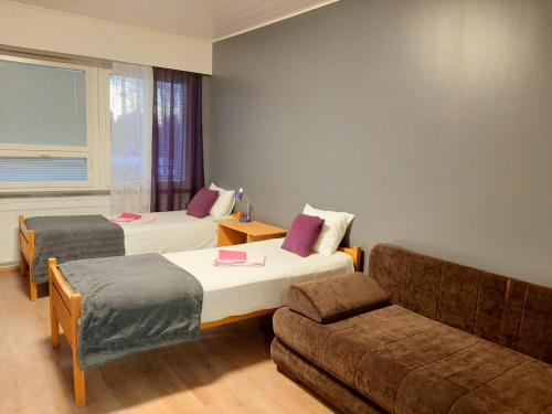 Center Hostel Kaatrahovi Room Type - Triple Room with Shared Bathroom