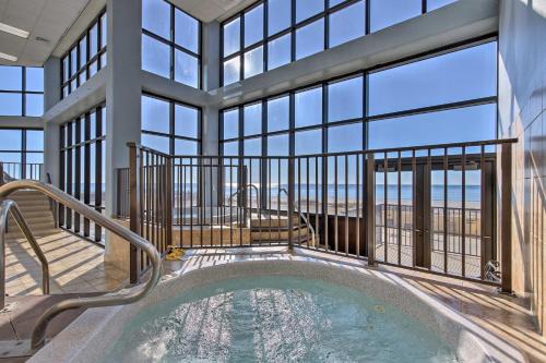Beachfront Getaway with Arcade, Pool, Gym and Sauna!