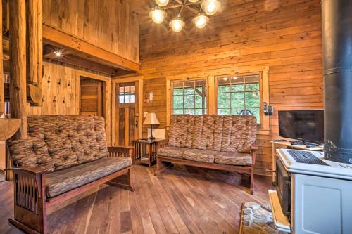 Scenic Log Cabin with Fire Pit and Stocked Creek! - image 10