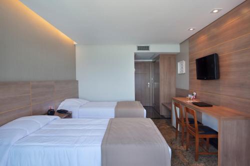 Royalty Barra Hotel Stop at Royalty Barra Hotel to discover the wonders of Rio De Janeiro. The hotel offers a wide range of amenities and perks to ensure you have a great time. 24-hour front desk, room service, meeting f