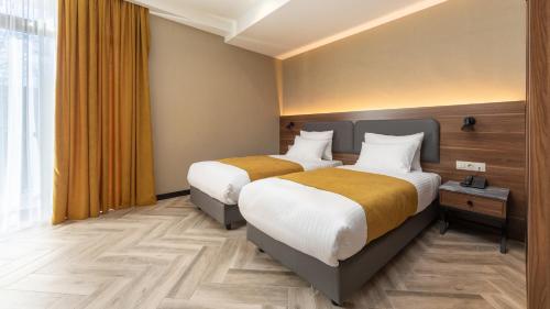 KOMOREBI BAKURIANI RESORT Room Type - Standard Twin Room