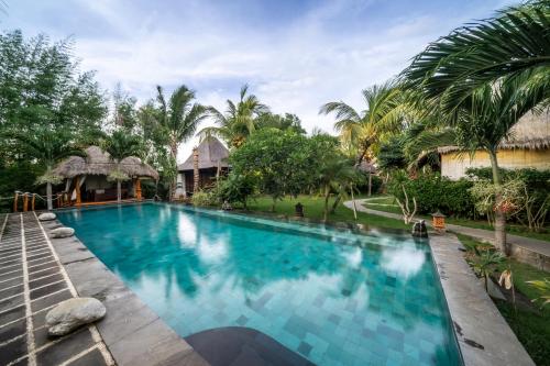 Flower Bud Bungalow Balangan – Canggu, ID