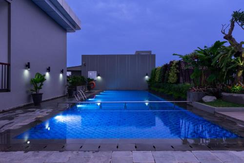 Swimming pool, Hotel Santika Pasir Koja Bandung near Batagor Kopo