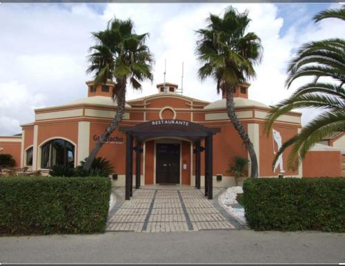 Restaurant, Gramacho Golf Bungalow private garden and terrace shared pool in Gramacho