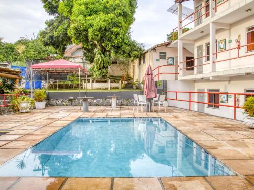 Swimming pool, OYO Praia Hotel Recanto do Tome - Salvador in Paripe