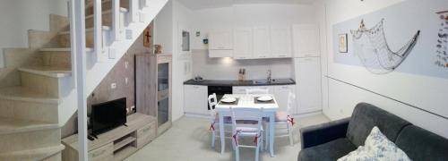 Koplietošanas atpūtas telpa ar TV, Cala Sardinia Apartment in Viddalba