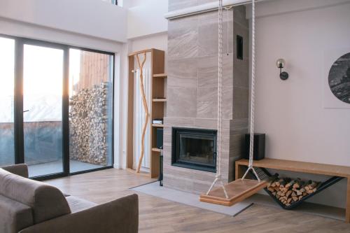 George Snow Apartments in New Gudauri - fireplace, 50m to Gondola lift