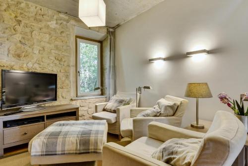 Koplietošanas atpūtas telpa ar TV, Designer Haus in Armissan