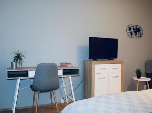 jaettu olohuone/TV alue, Hortenzia Apartman Pecs in Ispitaalja