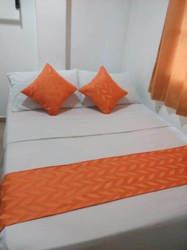 Bed, Hotel Torres del Parque No1 near Ernesto Cortissoz International Airport