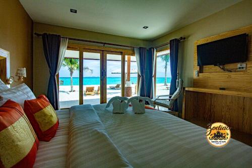 โซดิแอค ซีซั่น หลีเป๊ะ รีสอร์ท (Zodiac Seesun Resort) in ซันไรซ์ บีช