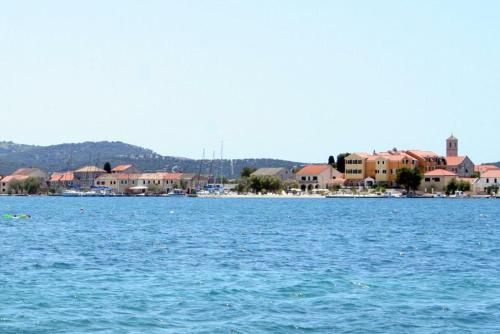 Family friendly seaside apartments Krapanj, Sibenik - 18004