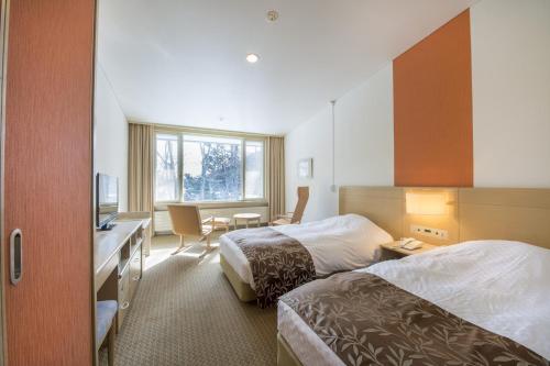 Chambre avec 2 lits