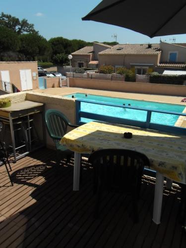 Appartement en duplex à 400 m de la plage dans résidence avec piscine commune 1 chambre 4 couchages WIFI LXOND47 - Location saisonnière - Portiragnes