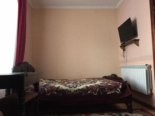 Economy Quadruple Room with Shared Bathroom