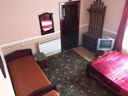 Economy Quadruple Room with Shared Bathroom