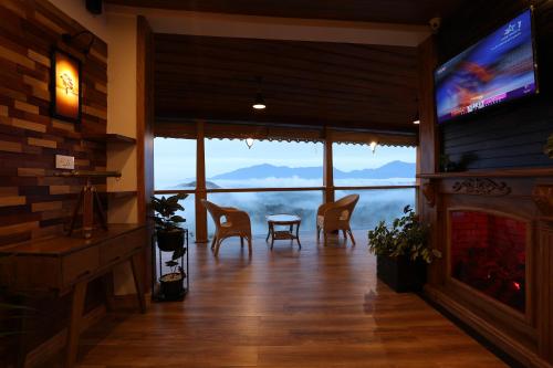 Közös társalgó / TV, Mount Xanadu Resorts in Ambalavayal