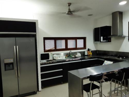 Kitchen, Lagos del Penon: Casa 10 - Puerto Madero in El Brasil