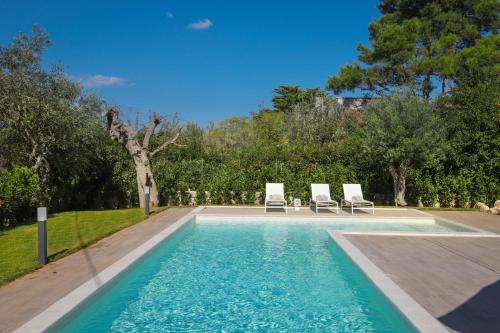  Trulli&Dimore - Villa Cavuzzi, Pension in Polignano a Mare
