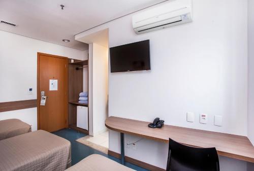 Total Hotel Set in a prime location of Sao Paulo, Total Hotel puts everything the city has to offer just outside your doorstep. The hotel offers guests a range of services and amenities designed to provide comfor