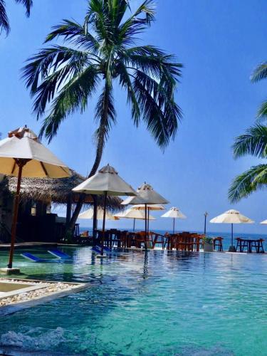 Sapphire Seas Beachfront Hotel – Hikkaduwa, CO