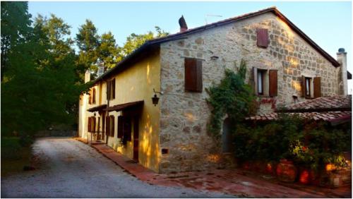  Podere Lamaccia - bed and kitchinette in Cetona