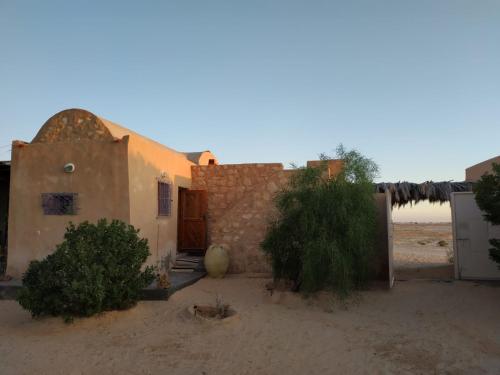Wejście, Grand Sud, la maison de sable in Douz