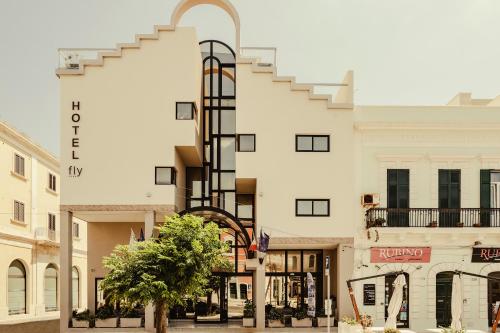 Hotel Fly - Tap to explore photos