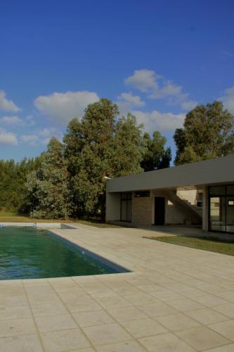 Swimming pool, Casas en Barrio Los Teros con pileta compartida - Santa Clara del Mar in Mar Del Plata City Center