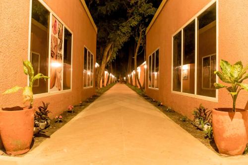 入口, 熱帶花園酒店 (Tropic Garden Hotel) in 丹尼斯角