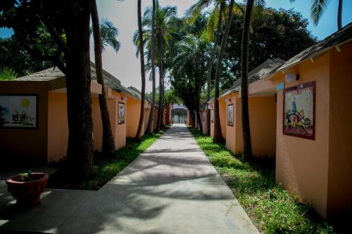 入口, 熱帶花園酒店 (Tropic Garden Hotel) in 丹尼斯角