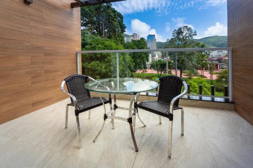 ระเบียง/ชานเรือน, Hotel Villa Fiori in ปอสซอสเดกาลเดส